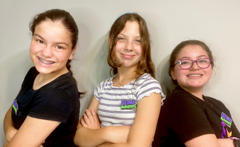 Young entrepreneurs selling handmade slime at Slime Monsters event