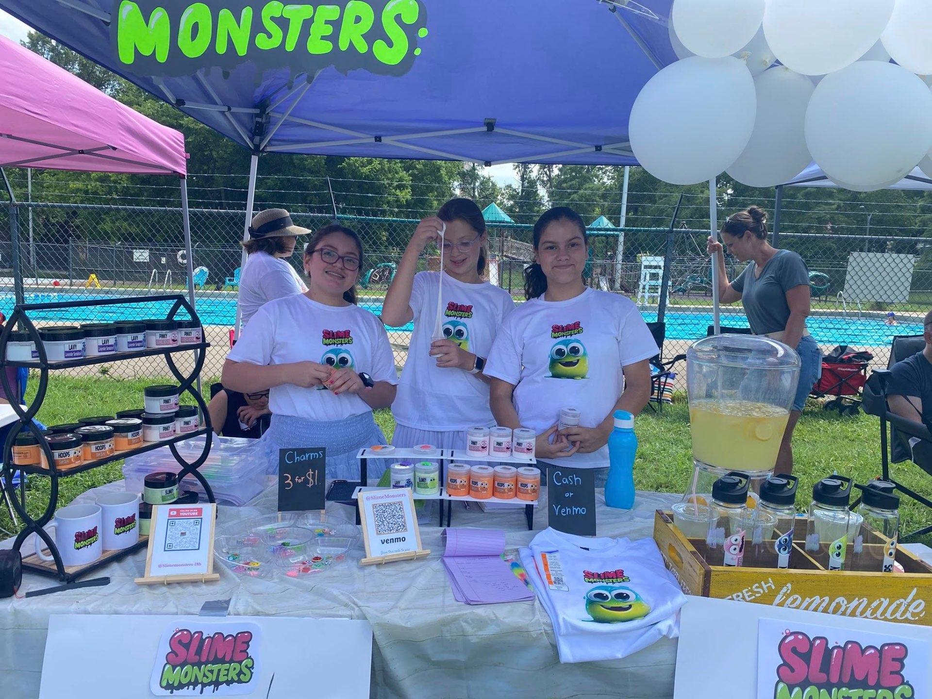Slime Monsters team at their market booth